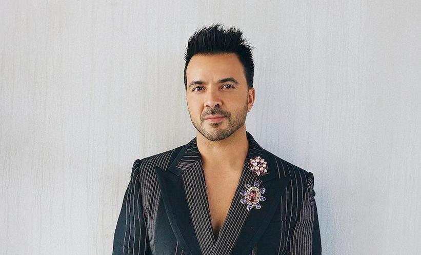 More Than 20 Years In, Luis Fonsi Vows To Never Stop Bringing The Romance With 'Ley De Gravedad': "It's How I See Life"